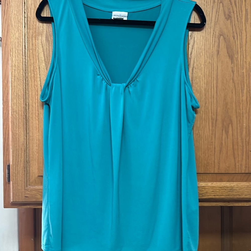 Jaclyn Smith teal blue sleeveless blouse